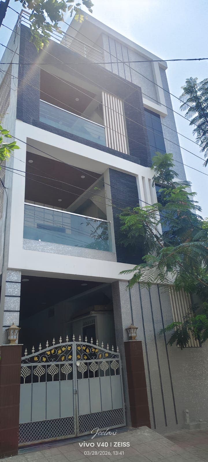 Charcoal & Glass Elevation, a residential project (G+3) by ASRG Construction in Kurnool